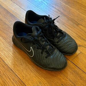 Nike Black Sneakers with White Swoosh Accent